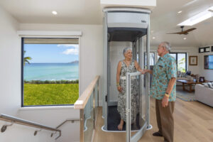 Senior couple using Stiltz home lift in Hawaii residence