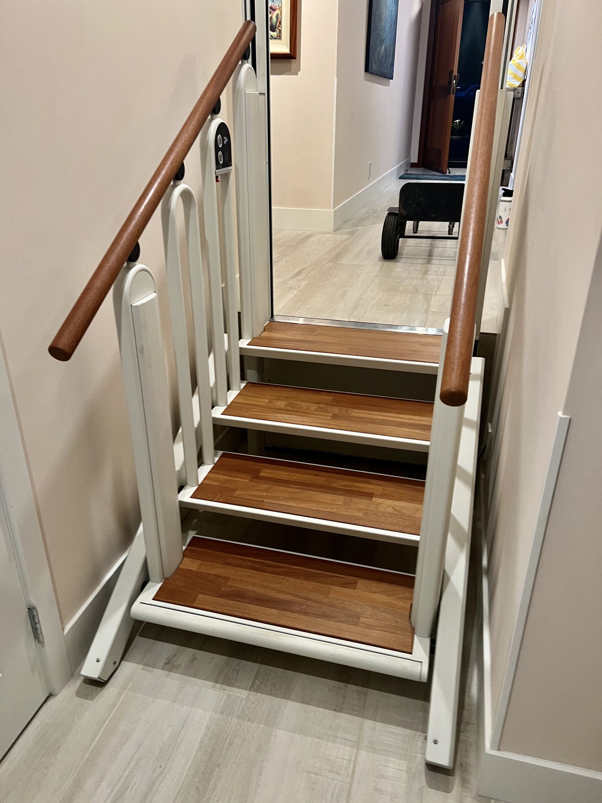 After FlexStep installation: a closer view of the installed FlexStep in stair mode from the lower hallway of the same home